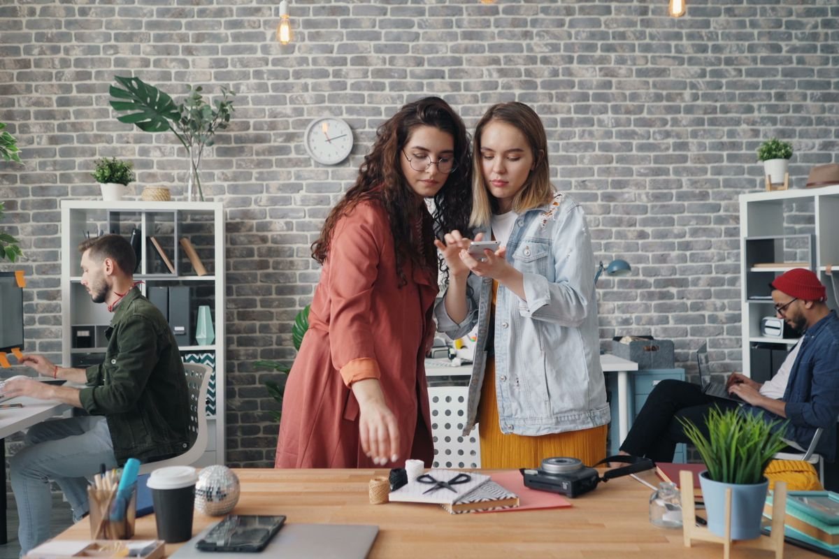 People working together on a device